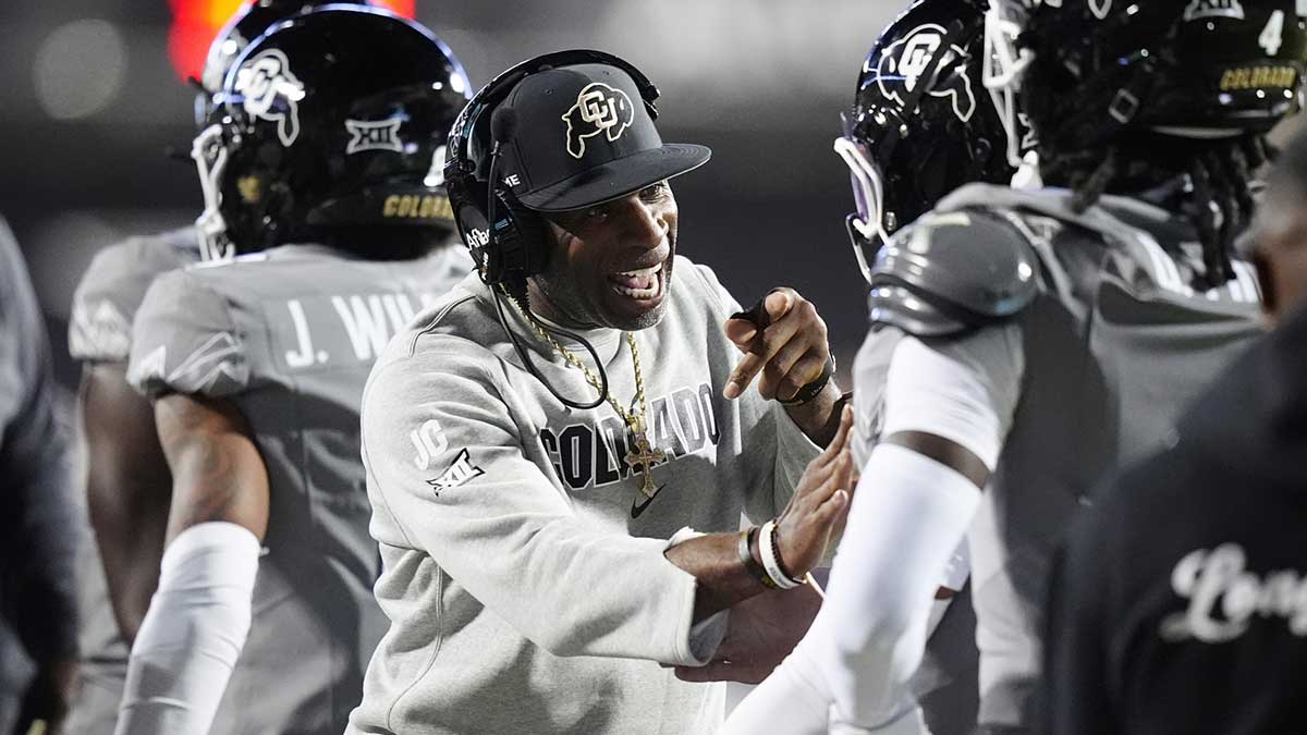Colorado Buffaloes head coach Deion Sanders reacts to a touchdown scored in the first quarter against the Colorado Buffaloes at Folsom Field.