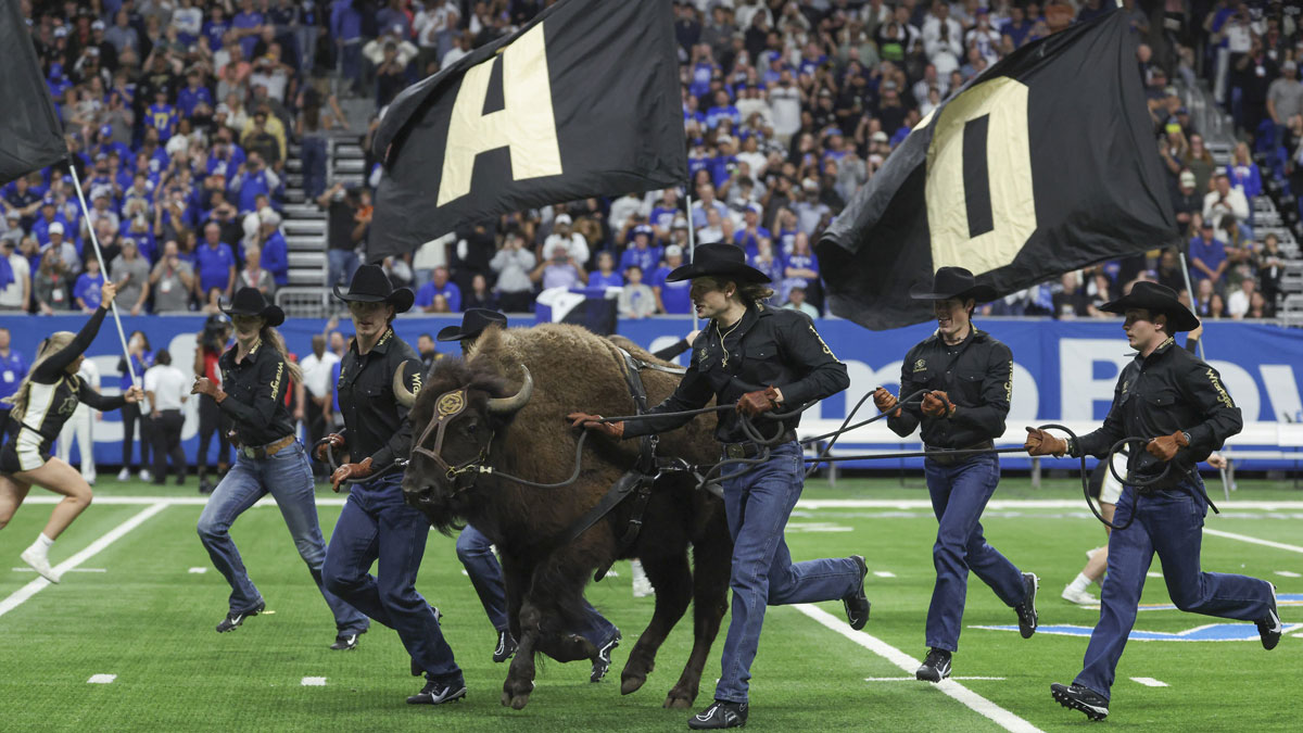 Colorado Buffaloes mascot Ralphie the Buffalo runs on the field before the game against the Brigham Young Cougars at Alamodome.