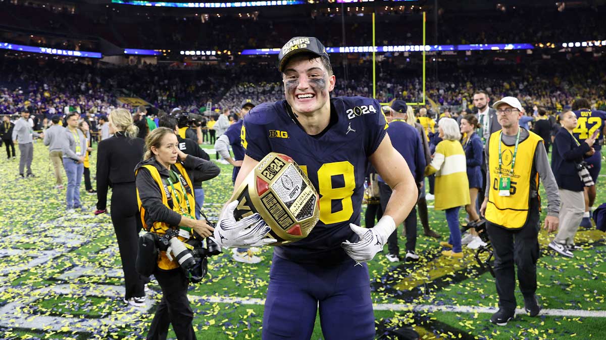 Michigan Wolverines tight end Colston Loveland (18) celebrates after winning 2024 College Football Playoff national championship game against the Washington Huskies at NRG Stadium.
