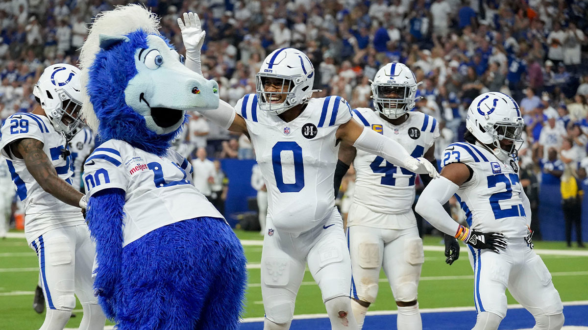 Indianapolis Colts mascot Blue celebrates with Indianapolis Colts safety Cam Bynum (0) after making an interception Sunday, Sept. 14, 2025, during a game against the Denver Broncos at Lucas Oil Stadium in Indianapolis.