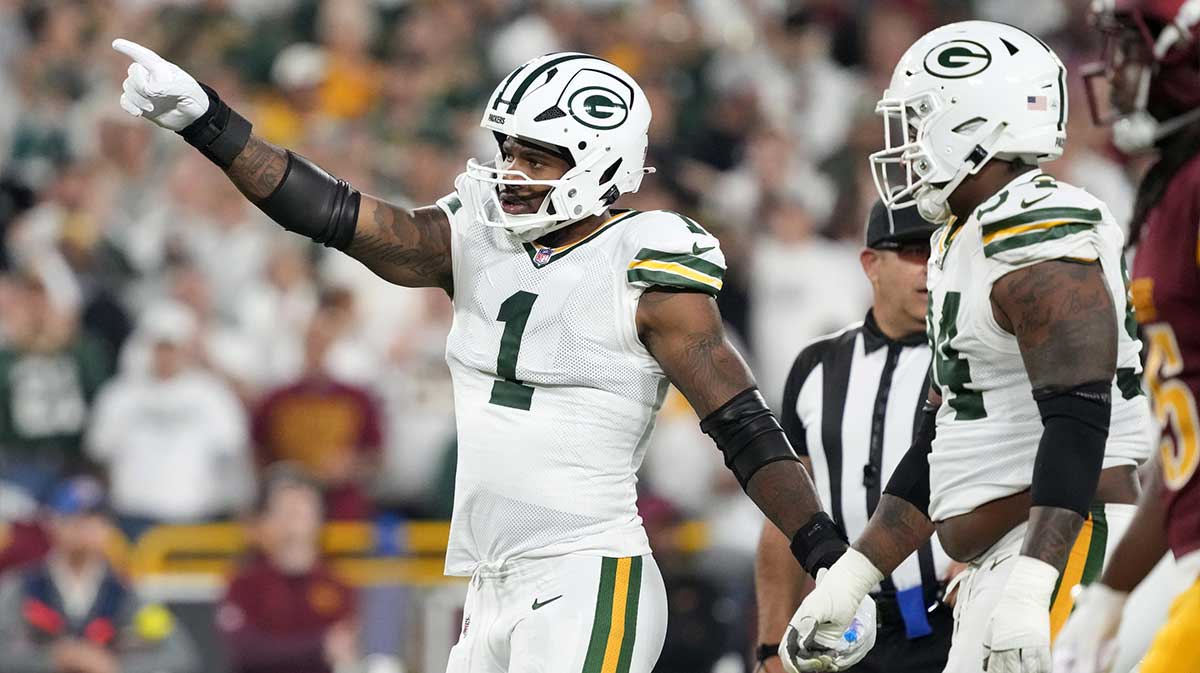 Green Bay Packers defensive end Micah Parsons (1) reacts in the first quarter against the Washington Commanders at Lambeau Field.