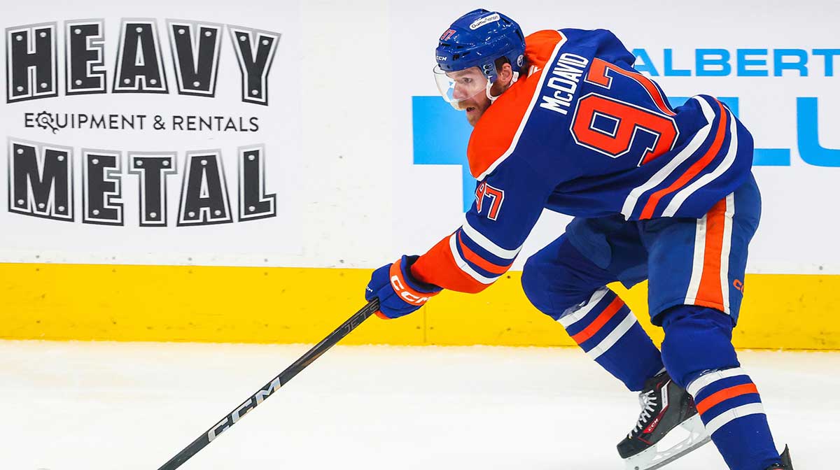 Edmonton Oilers center Connor McDavid (97) skates with the puck against the Florida Panthers during the first period in game five of the 2025 Stanley Cup Final at Rogers Place.