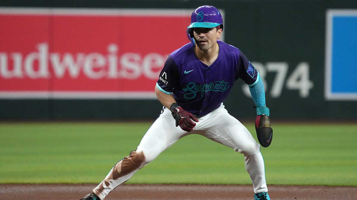 Arizona Diamondbacks outfielder Corbin Carroll (7) leads off second base against the Boston Red Sox in the first inning at Chase Field.