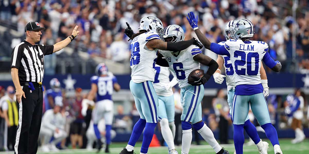 Dallas Cowboys safety Donovan Wilson (6) celebrates with safety Malik Hooker (28) after making an interception against the New York Giants during overtime at AT&T Stadium. Mandatory Credit: Kevin Jairaj-Imagn Images