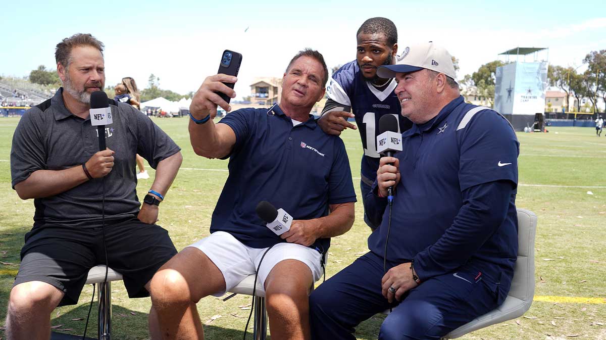 Cowboys linebacker Micah Parsons (11) and coach Mike McCarthy during training camp at the River Ridge Fields