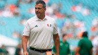 Miami Hurricanes head coach Mario Cristobal looks on before a game against the South Florida Bulls at Hard Rock Stadium.