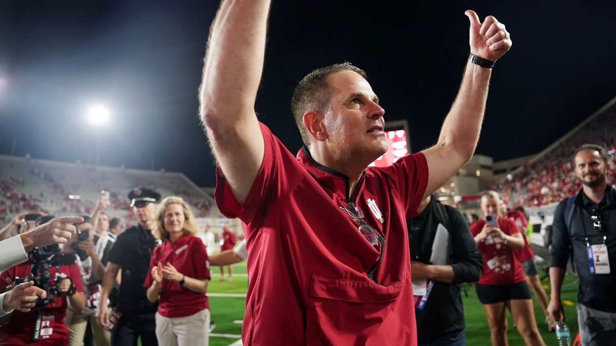 Indiana Hoosiers head coach Curt Cignetti celebrates after defeating the Illinois Fighting Illini at Memorial Stadium.
