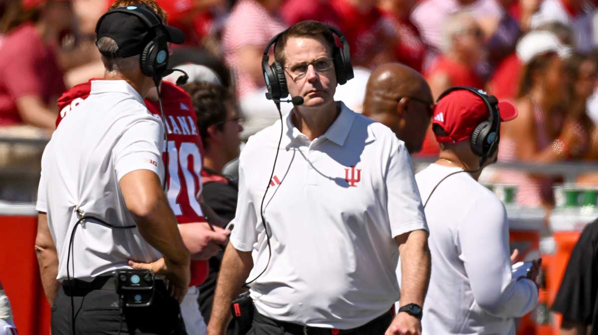 Indiana Hoosiers head coach Curt Cignetti walks along the sideline during the first half against the Old Dominion Monarchs at Memorial Stadium.