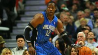 Orlando Magic center Dwight Howard (12) with the ball in the second half against the Chicago Bulls at the United Center. The Magic defeated the Bulls 107-78.
