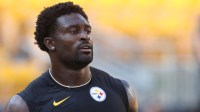 Pittsburgh Steelers wide receiver DK Metcalf (4) warms up before the game against the Tampa Bay Buccaneers at Acrisure Stadium.