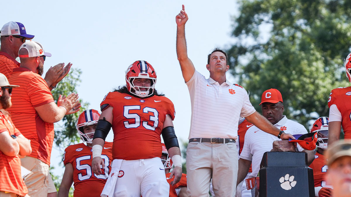 Clemson Tigers head coach Dabo Swinney joins in the Walk of Champions march after pregame practice before their game against the Syracuse Orange in Memorial Stadium. Mandatory Credit: Ken Ruinard/GREENVILLE NEWS-USA TODAY Network via Imagn Images