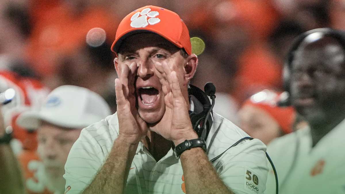Clemson head coach Dabo Swinney communicates with a referee in the game with Louisiana State University during the second quarter at Memorial Stadium in Clemson, S.C. Saturday, Aug 30, 2025.