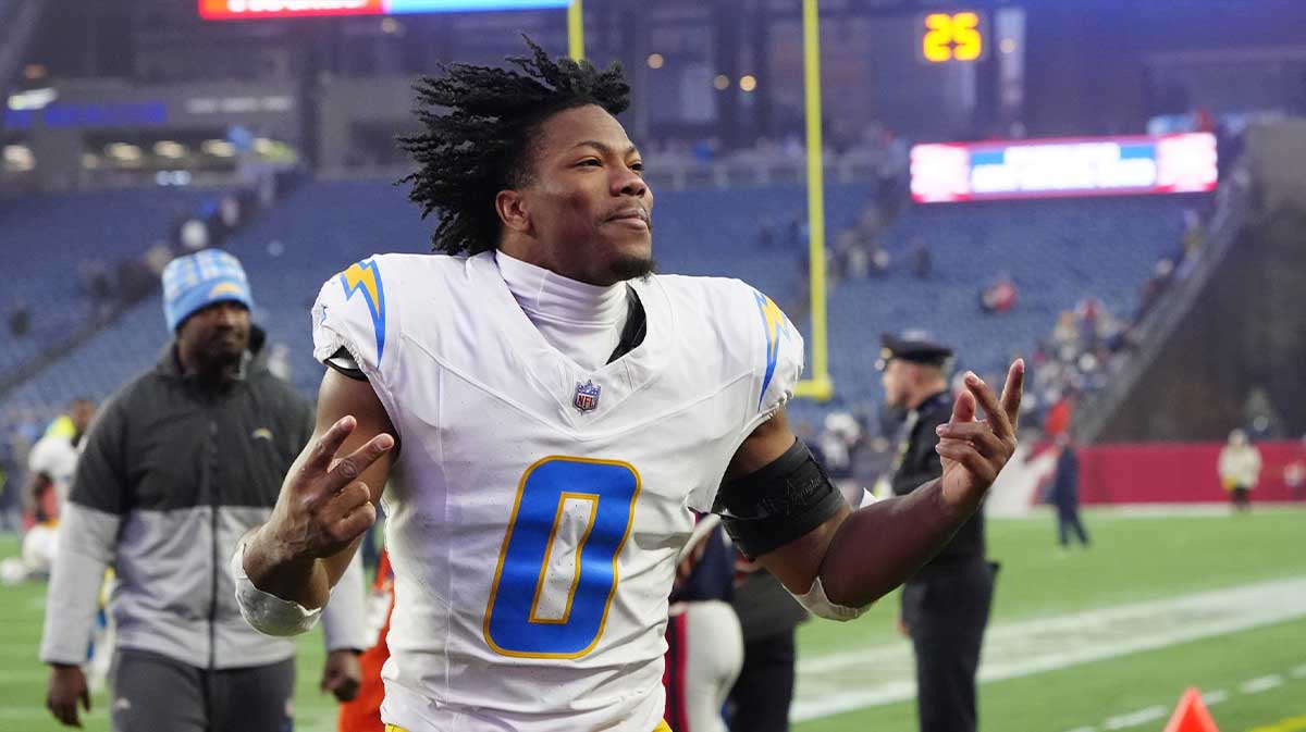 Dec 28, 2024; Foxborough, Massachusetts, USA; Los Angeles Chargers linebacker Daiyan Henley (0) celebrates after defeating the New England Patriots
