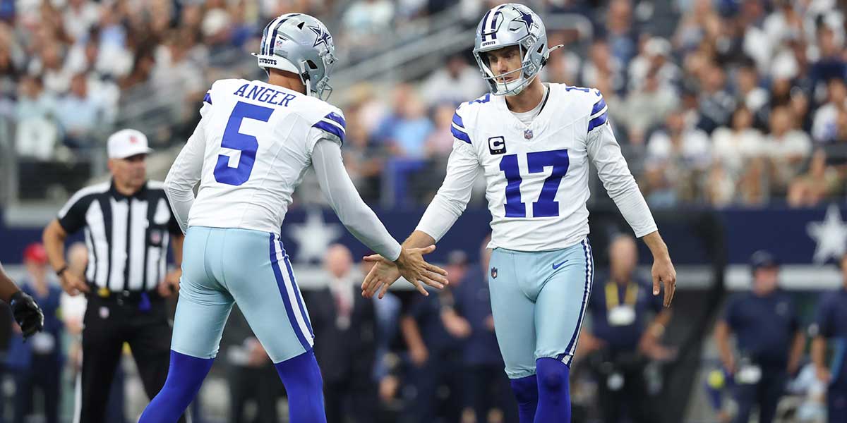 Dallas Cowboys place kicker Brandon Aubrey (17) high fives punter Bryan Anger (5) after a field goal against the New York Giants during the second quarter at AT&T Stadium.