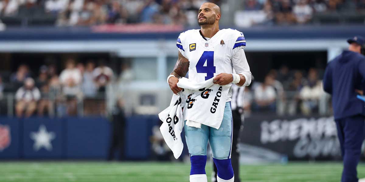 Dallas Cowboys quarterback Dak Prescott (4) reacts on the sideline during overtime against the New York Giants at AT&T Stadium.