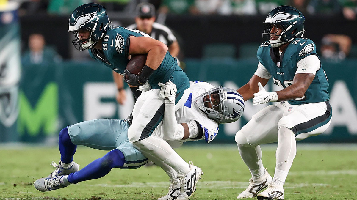 Dallas Cowboys cornerback Trevon Diggs (7) tackles Philadelphia Eagles tight end Dallas Goedert (88) during the fourth quarter of the game at Lincoln Financial Field.