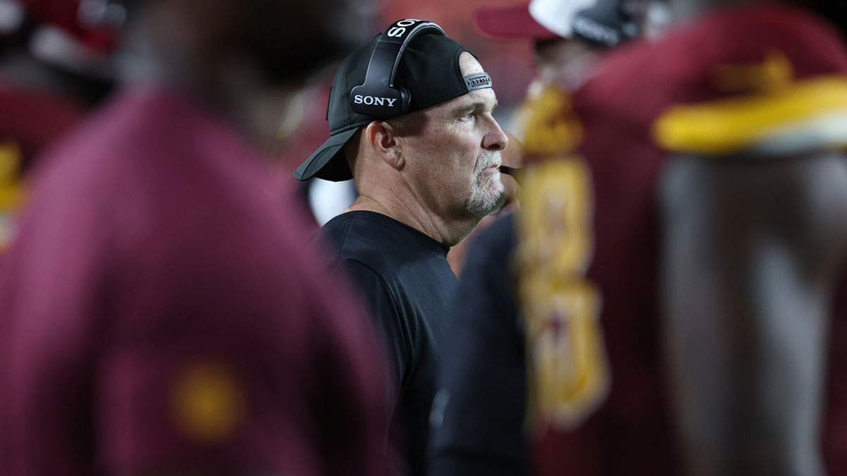 Washington Commanders head coach Dan Quinn looks on from the sidelines against Cincinnati Bengals during the second half at Northwest Stadium.