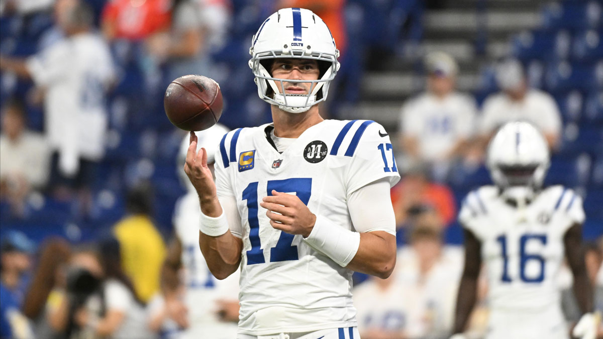 Indianapolis Colts quarterback Daniel Jones (17) warms up prior to the game against the Denver Broncos at Lucas Oil Stadium.