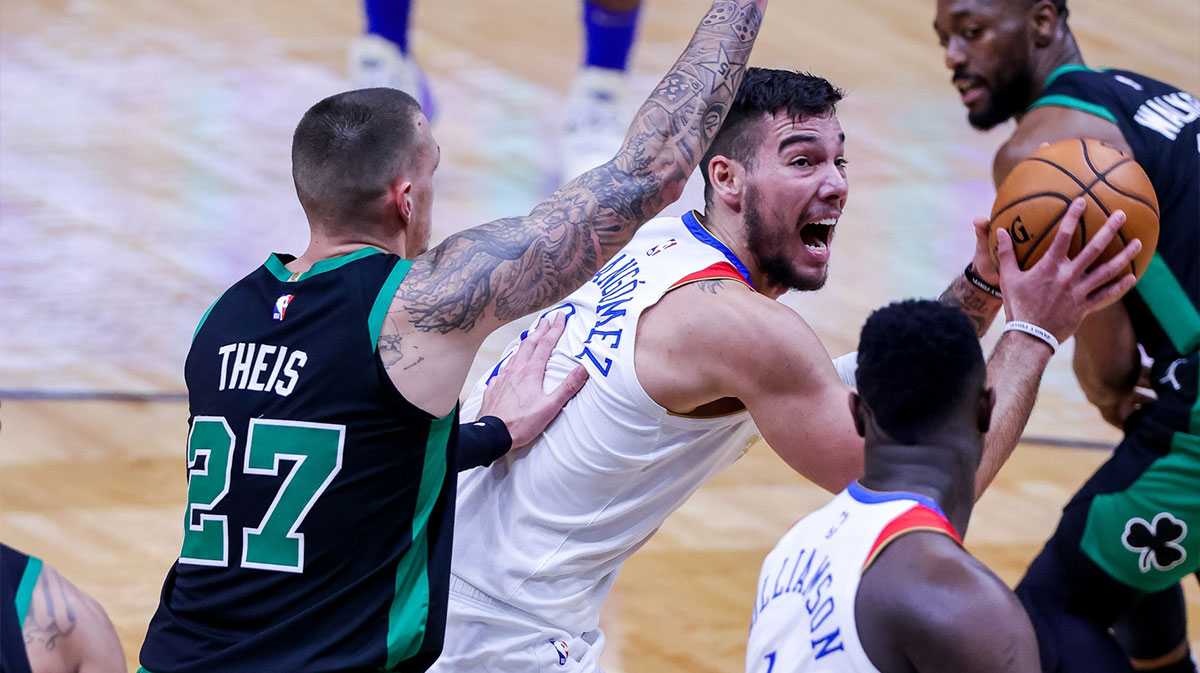New Orleans Pelicans center Willy Hernangomez (9) goes to the basket against Boston Celtics center Daniel Theis (27) during the first half at Smoothie King Center.
