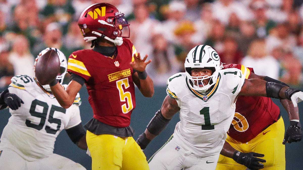Green Bay Packers defensive end Micah Parsons (1) rushes Washington Commanders quarterback Jayden Daniels (5) on Thursday, September 11, 2025, at Lambeau Field in Green Bay, Wis. The Packers won the game, 27-18