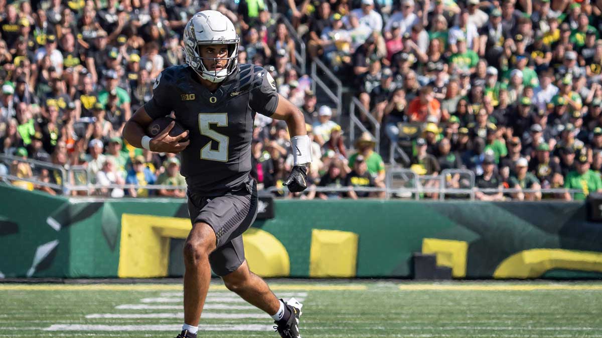 Oregon Ducks quarterback Dante Moore carries the ball as the Oregon Ducks host the Oregon State Beavers Sept. 20, 2025, at Autzen Stadium in Eugene, Oregon.