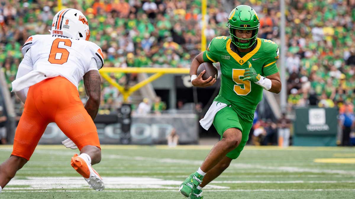 Oregon quarterback Dante Moore carries the ball as the Oregon Ducks host the Oklahoma State Cowboys on Sept. 6, 2025, at Autzen Stadium in Eugene, Oregon.