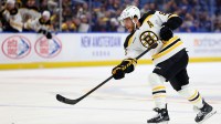 Boston Bruins right wing David Pastrnak (88) takes a shot on goal during the third period against the Buffalo Sabres at KeyBank Center.