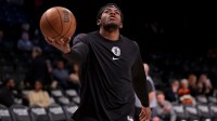 Brooklyn Nets center Day'Ron Sharpe (20) warms up before a game against the Charlotte Hornets at Barclays Center.