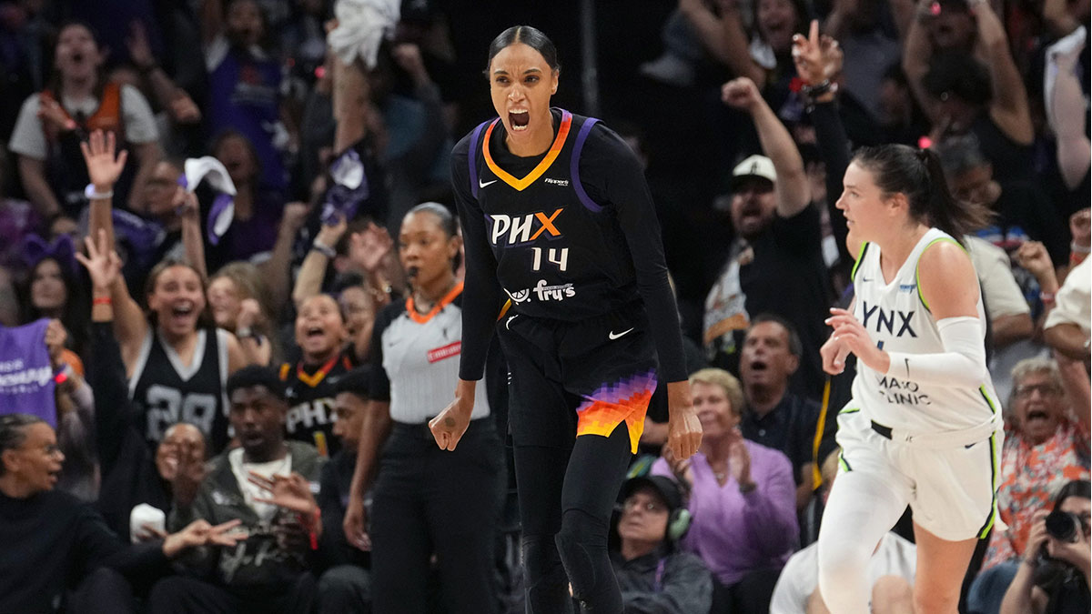 Phoenix Mercury forward DeWanna Bonner (14) celebrates her 3-point shot against the Minnesota Lynx during their WNBA semifinal playoff game at PHX Arena on Sept. 28, 2025.