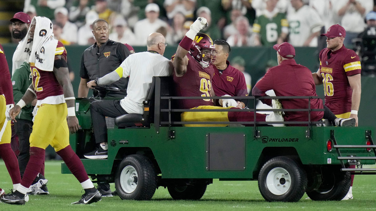 Washington Commanders defensive end Deatrich Wise Jr. (91) is carted off the field after being injured during the second quarter of their game Thursday, September 11, 2025 at Lambeau Field in Green Bay, Wisconsin. The Green Bay Packers beat the Washington Commanders 27-18