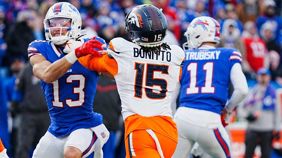 Buffalo Bills wide receiver Mack Hollins blocks against Denver Broncos Nik Bonitto during the second half of the Buffalo Bills wild card game against the Denver Broncos at Highmark Stadium in Orchard Park on Jan. 12, 2025.