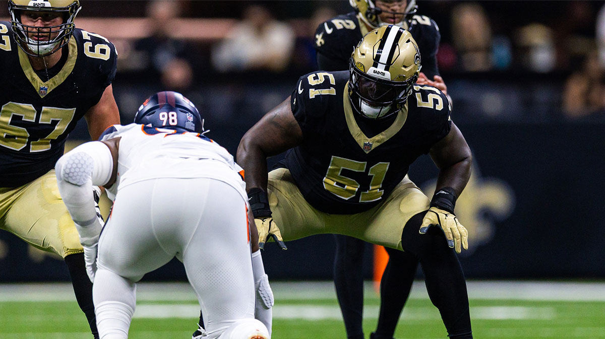 New Orleans Saints center Cesar Ruiz (51) blocks Denver Broncos defensive end John Franklin-Myers (98) during the first half at Caesars Superdome.
