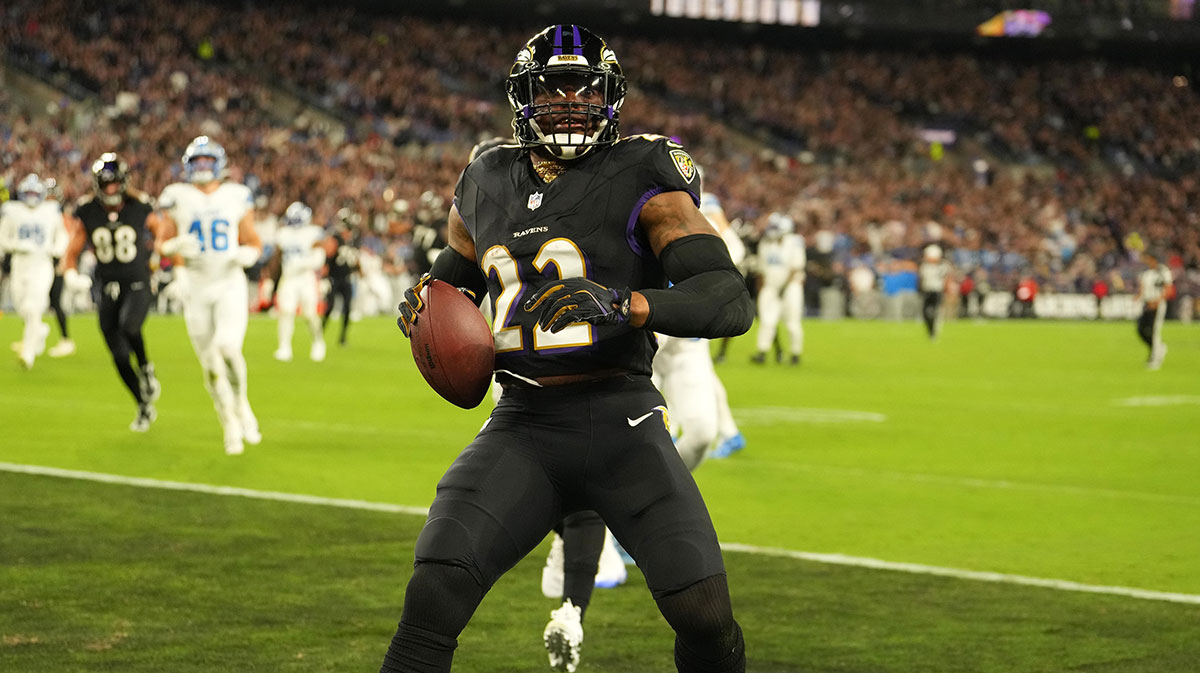 Baltimore Ravens running back Derrick Henry (22) rushes for a touchdown against the Detroit Lions during the first half at M&T Bank Stadium.