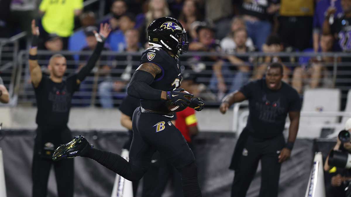 Baltimore Ravens running back Derrick Henry (22) rushes the ball for a touchdown against the Detroit Lions during the first half at M&T Bank Stadium.