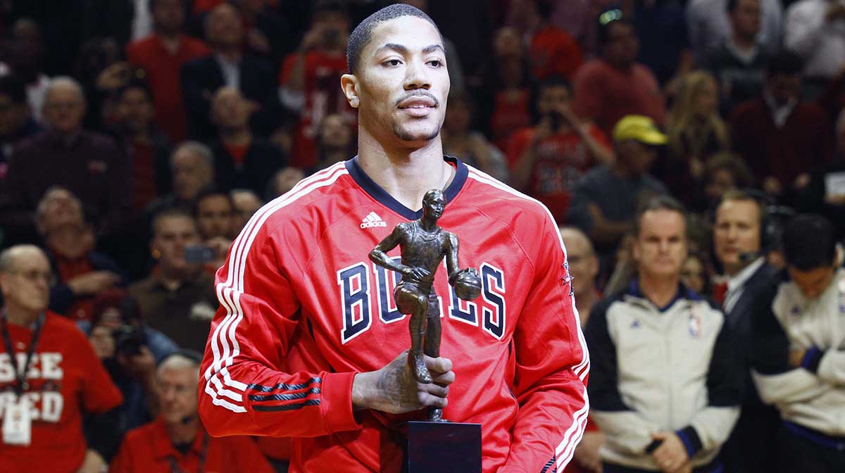 Chicago Bulls point guard Derrick Rose (1) is presented the MVP trophy before game one of the second round of the 2011 NBA playoffs against the Atlanta Hawks at the United Center.