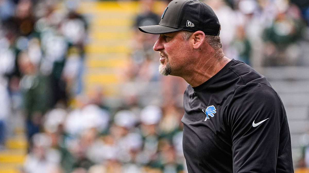 Detroit Lions head coach Dan Campbell watches warm up at Lambeau Field in Green Bay, Wisconsin.