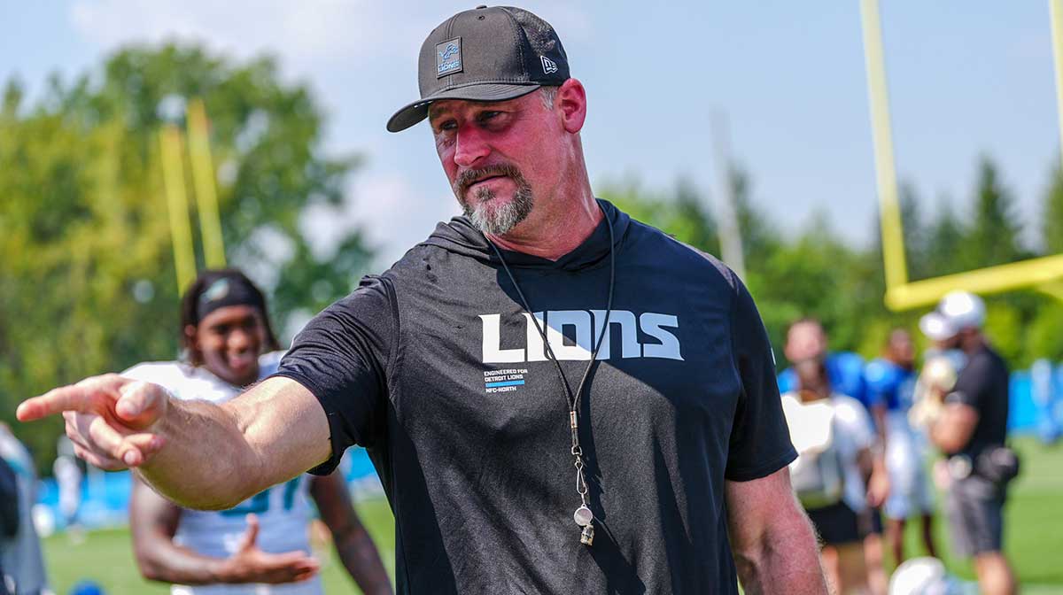 Detroit Lions head coach Dan Campbell talks to staff at the end of the joint practice with the Miami Dolphins at the Lions headquarters and training facility in Allen Park, Thursday, Aug. 14 2025.