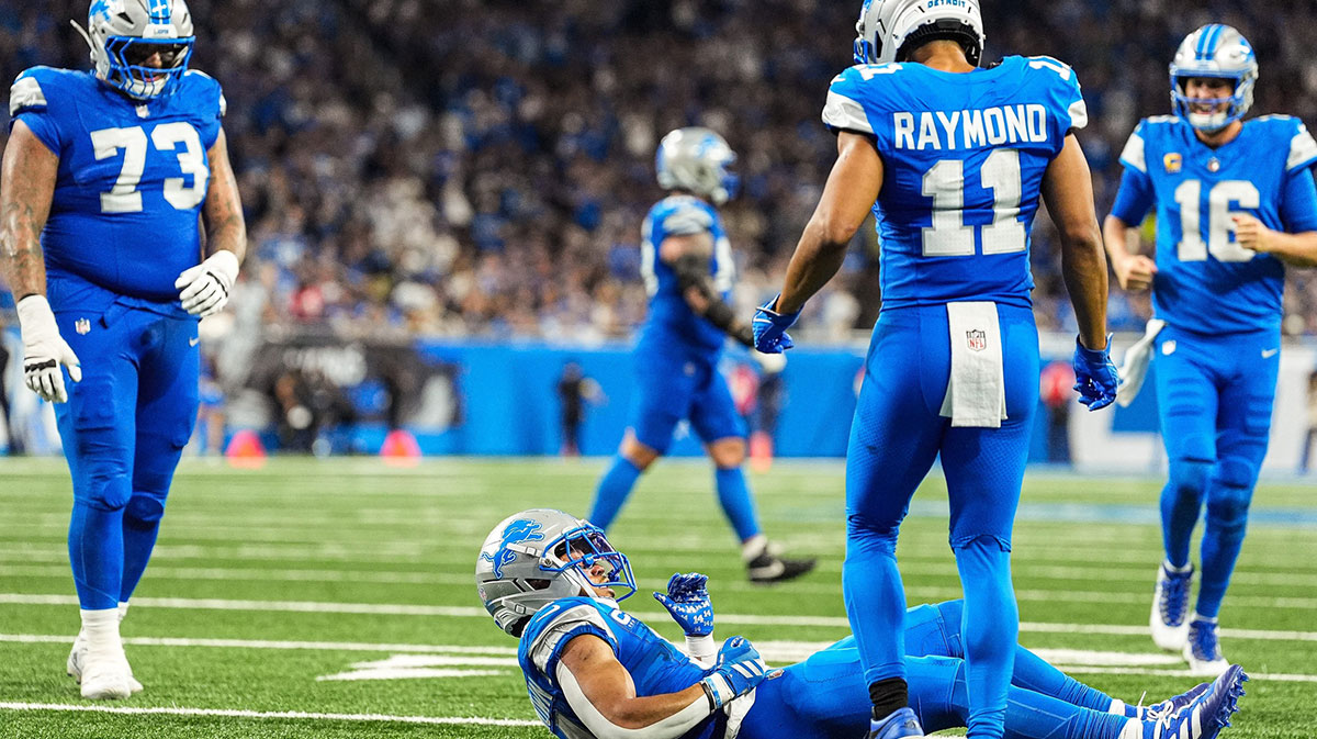 Detroit Lions wide receiver Amon-Ra St. Brown (14), center left, celebrates scoring a touchdown against Chicago Bears during the second half at Ford Field in Detroit on Sunday, Sept. 14, 2025.
