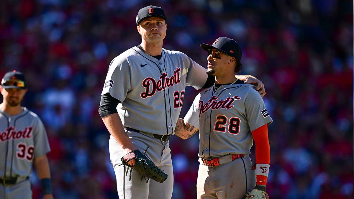 Detroit Tigers pitcher Tarik Skubal (29) is congratulated by outfielder Javier Báez (28) before being relieved against the Cleveland Guardians in the eighth inning during game one of the Wildcard round for the 2025 MLB playoffs at Progressive Field.