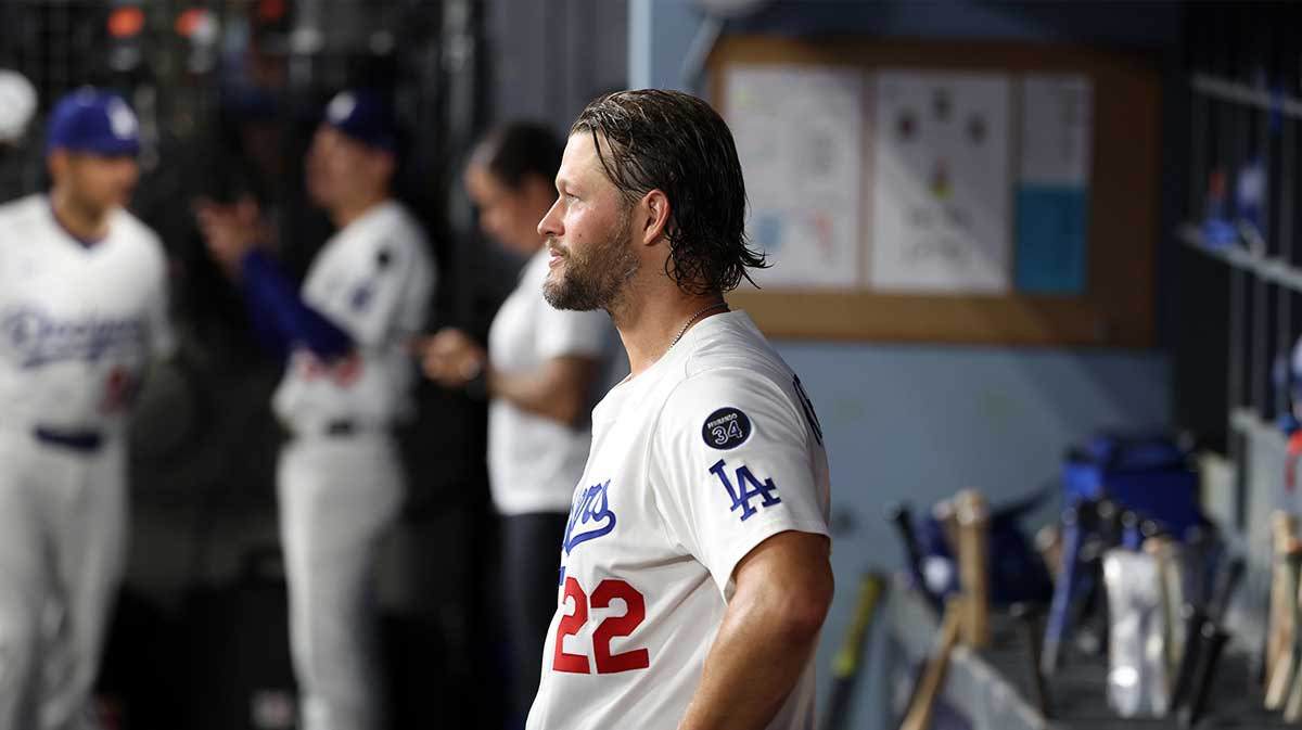 Los Angeles Dodgers pitcher Clayton Kershaw (22) looks on in the dugout after being relieved during the fifth inning against the San Francisco Giants at Dodger Stadium.