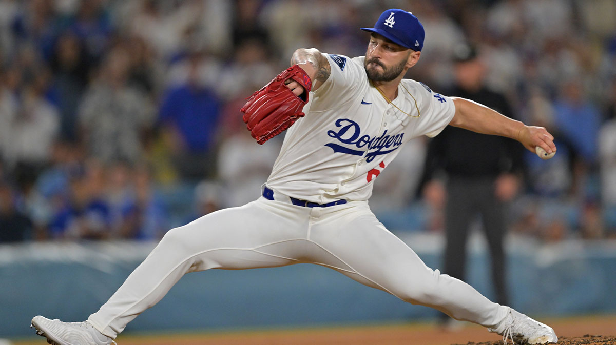 Los Angeles Dodgers relief pitcher Tanner Scott (66) earns a save in the ninth inning against the Philadelphia Phillies at Dodger Stadium.