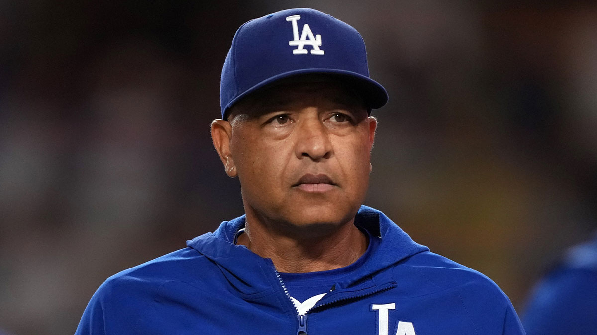 Los Angeles Dodgers manager Dave Roberts (30) reacts after the game against the Colorado Rockies at Dodger Stadium.