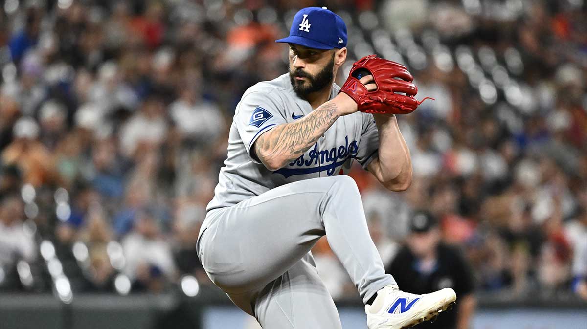 Dodgers pitcher Tanner Scott (66) delivers a pitch