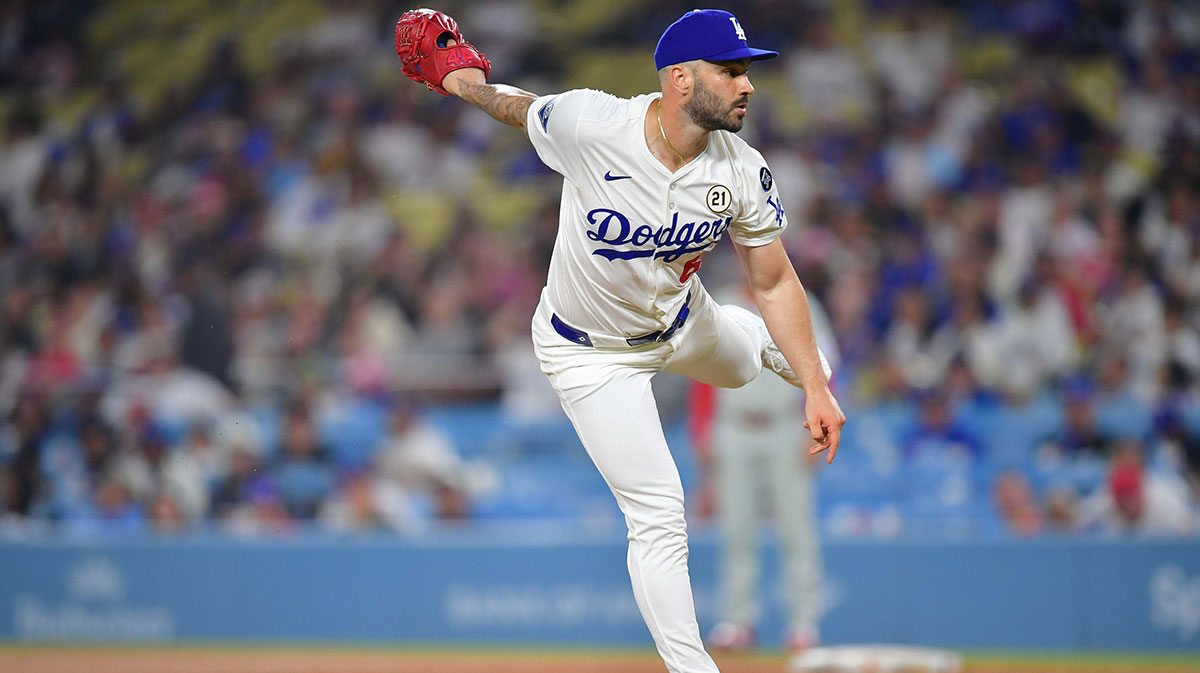 Dodgers pitcher Tanner Scott (66) throws vs. Phillies