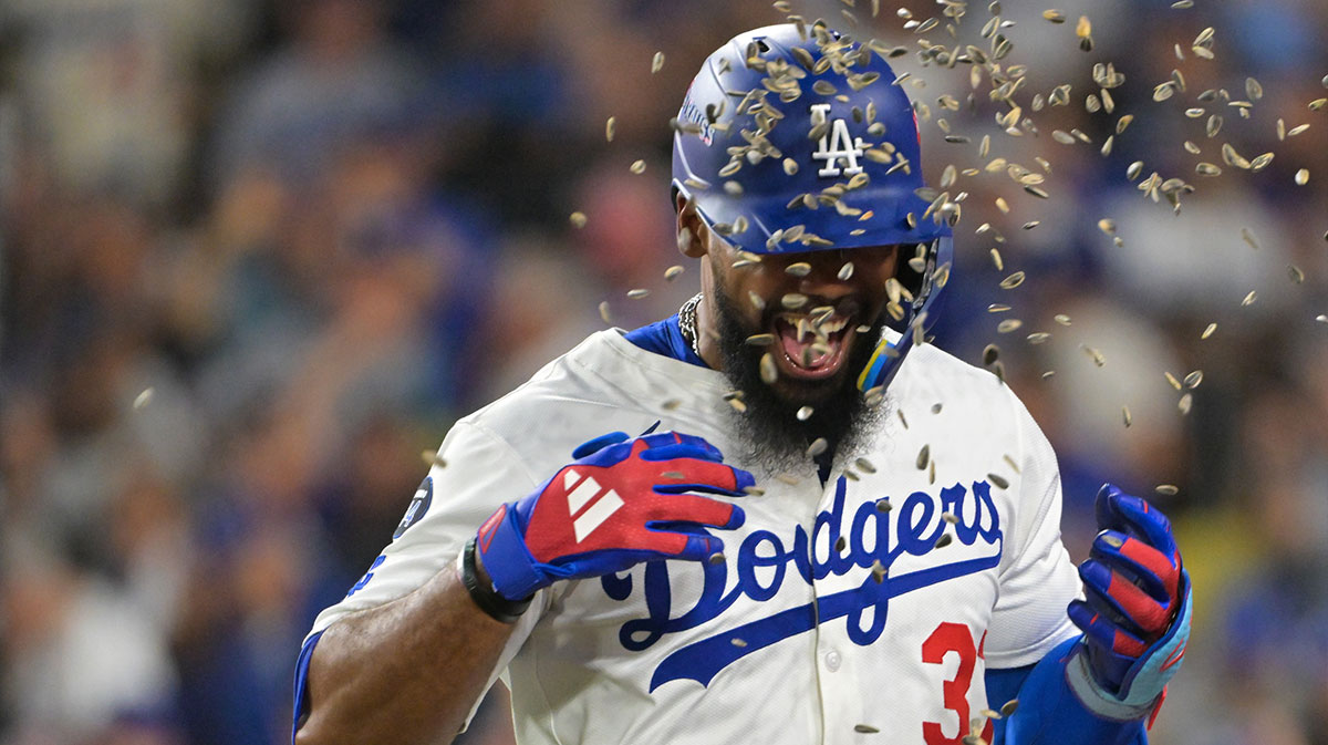 Los Angeles Dodgers right fielder Teoscar Hernandez (37) celebrates after hitting a home run during the fifth inning against the Cincinnati Reds during game one of the Wildcard round for the 2025 MLB playoffs at Dodger Stadium.