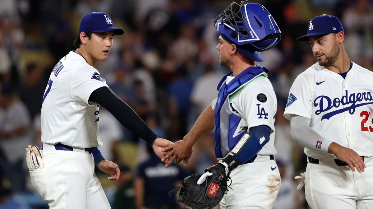 Los Angeles Dodgers designated hitter Shohei Ohtani (17) and catcher Ben Rortvedt (47) celebrate a win after defeating the San Francisco Giants 2-1 at Dodger Stadium.