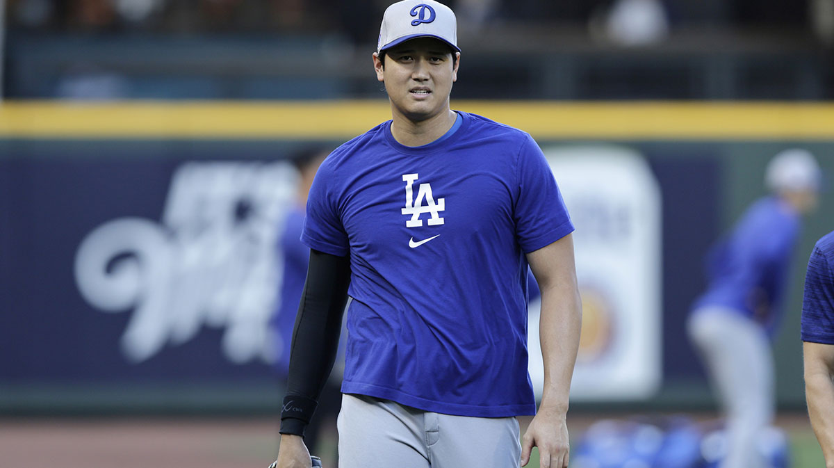 Los Angeles Dodgers two-way player Shohei Ohtani walks off the field before playing the Seattle Mariners at T-Mobile Park.