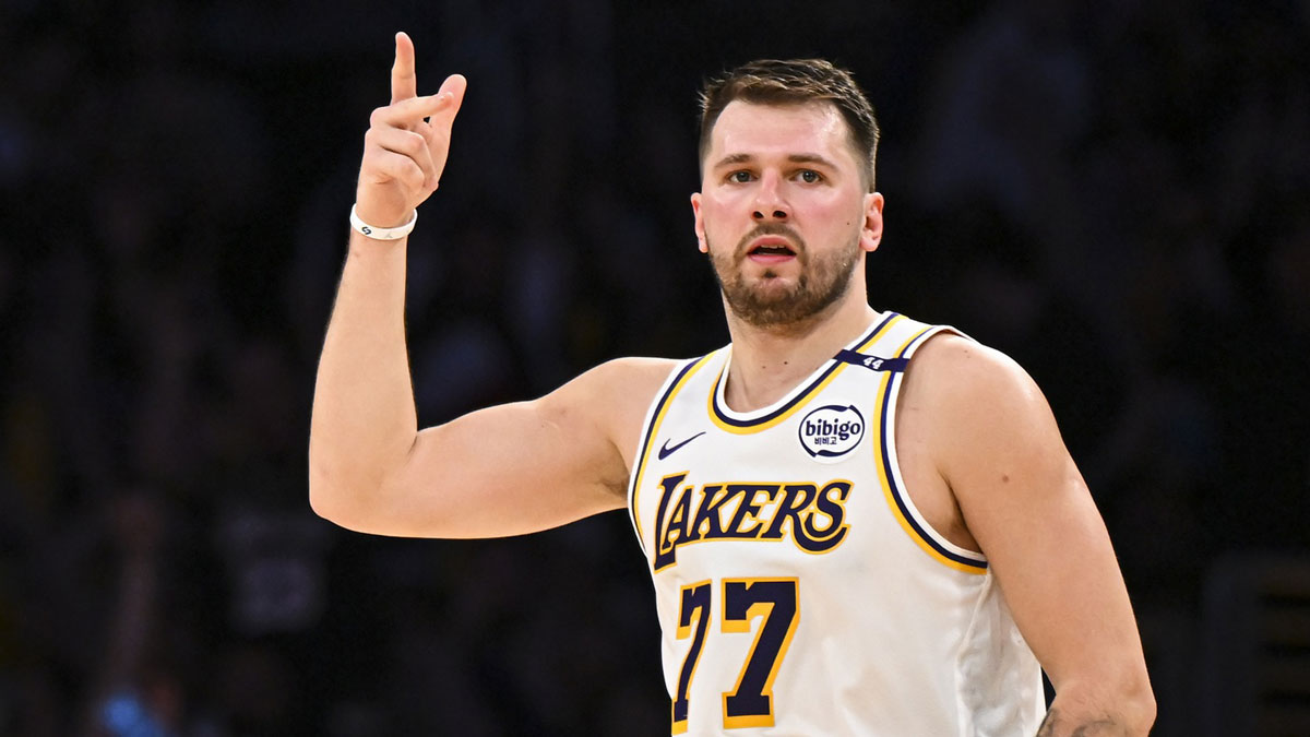 Los Angeles Lakers guard Luka Doncic (77) reacts after scoring against Chicago Bulls during the first half at Crypto.com Arena.
