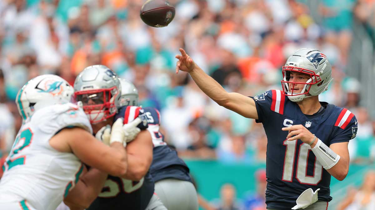 New England Patriots quarterback Drake Maye (10) passes the football against the Miami Dolphins during the third quarter at Hard Rock Stadium.