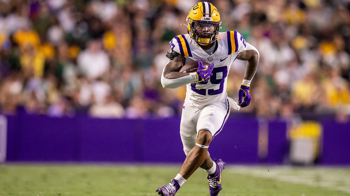LSU Tigers running back Caden Durham (29) runs against the Southeastern Louisiana Lions during the first half at Tiger Stadium.